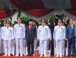 Pejabat Bupati Tapanuli Utara Hadiri Upacara Peringatan Hari Otonomi Daerah XXVIII Tahun 2024 Di Kota Surabaya