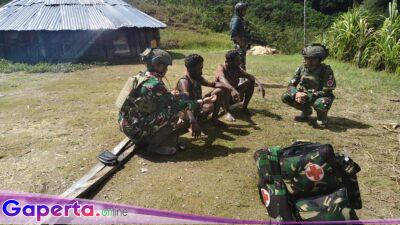 “Satgas TNI Tembus Honai Warga Kampung Wombru, Beri Pelayanan Kesehatan Gratis di Tengah Pegunungan Puncak”